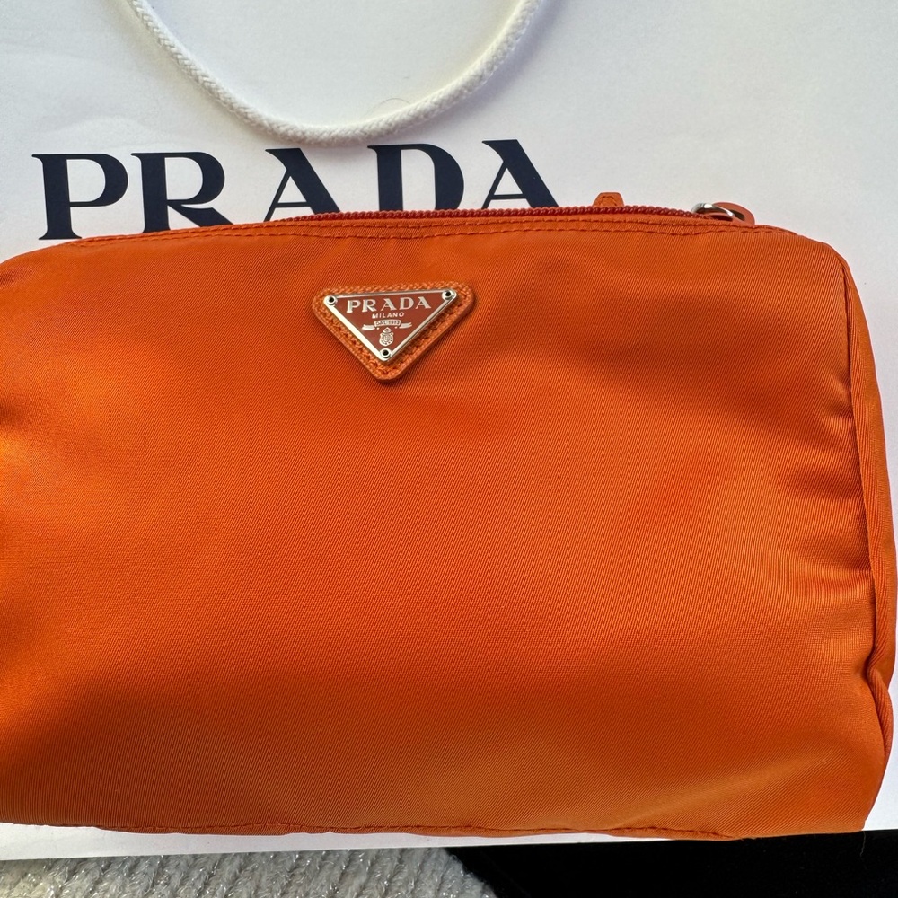 Prada bag. New orangey for extra fun.
